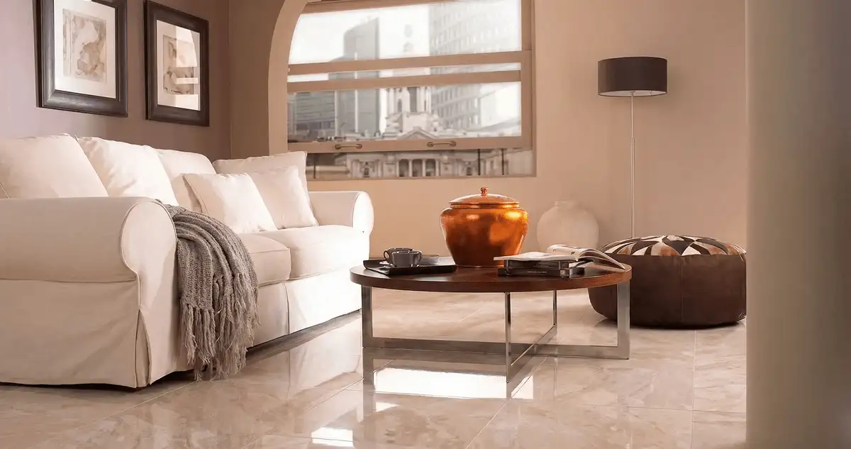 Modern living room with professionally installed marble flooring, a beige sofa, coffee table in Philadelphia, PA