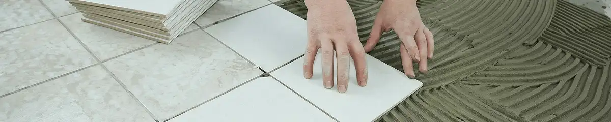Professional installing white tile floors in Philadelphia, PA