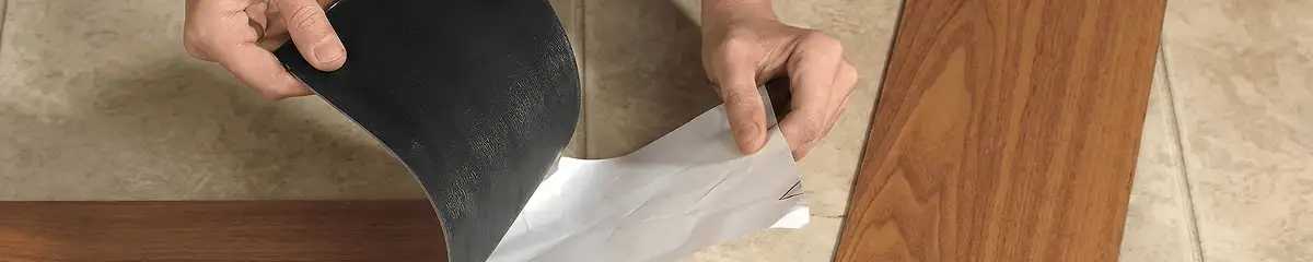 A professional installing vinyl flooring in Philadelphia, PA